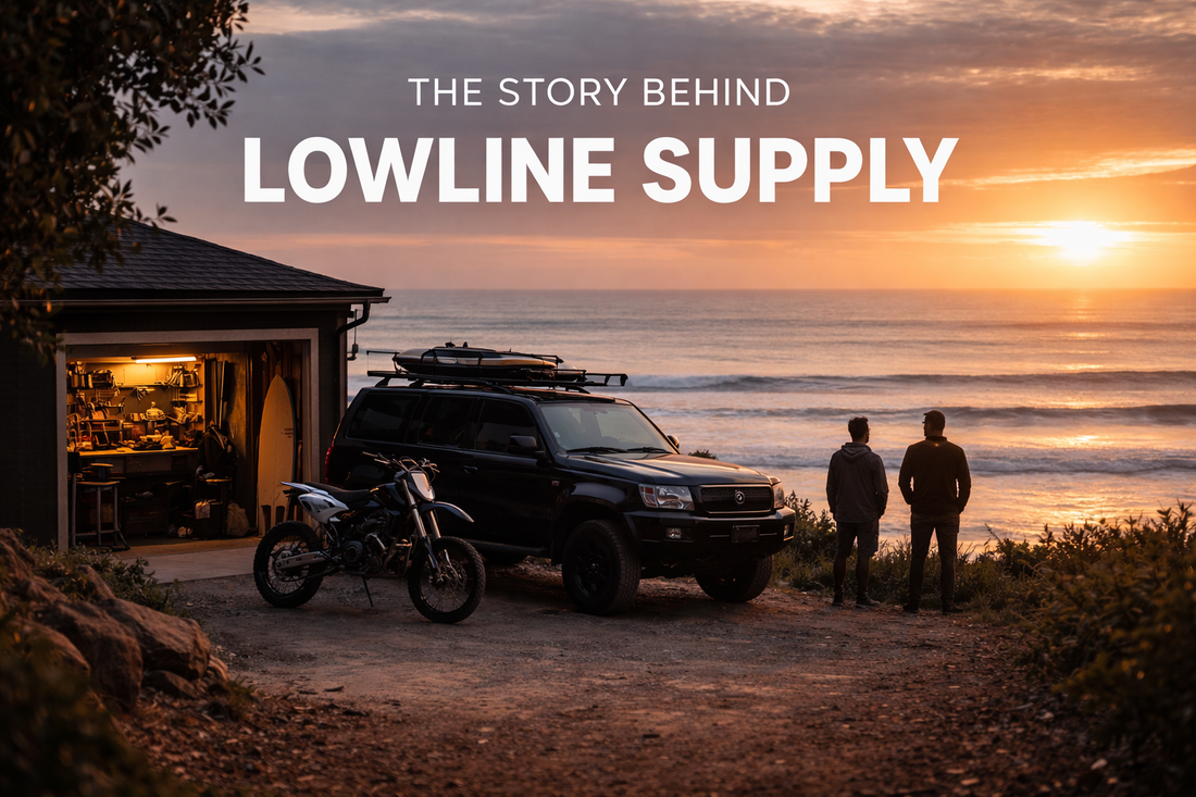 Scenic coastal sunset image for Lowline Supply showing a black 4WD, dirt bike, open garage and two people overlooking the ocean, with the title “The Story Behind Lowline Supply” in bold white text.