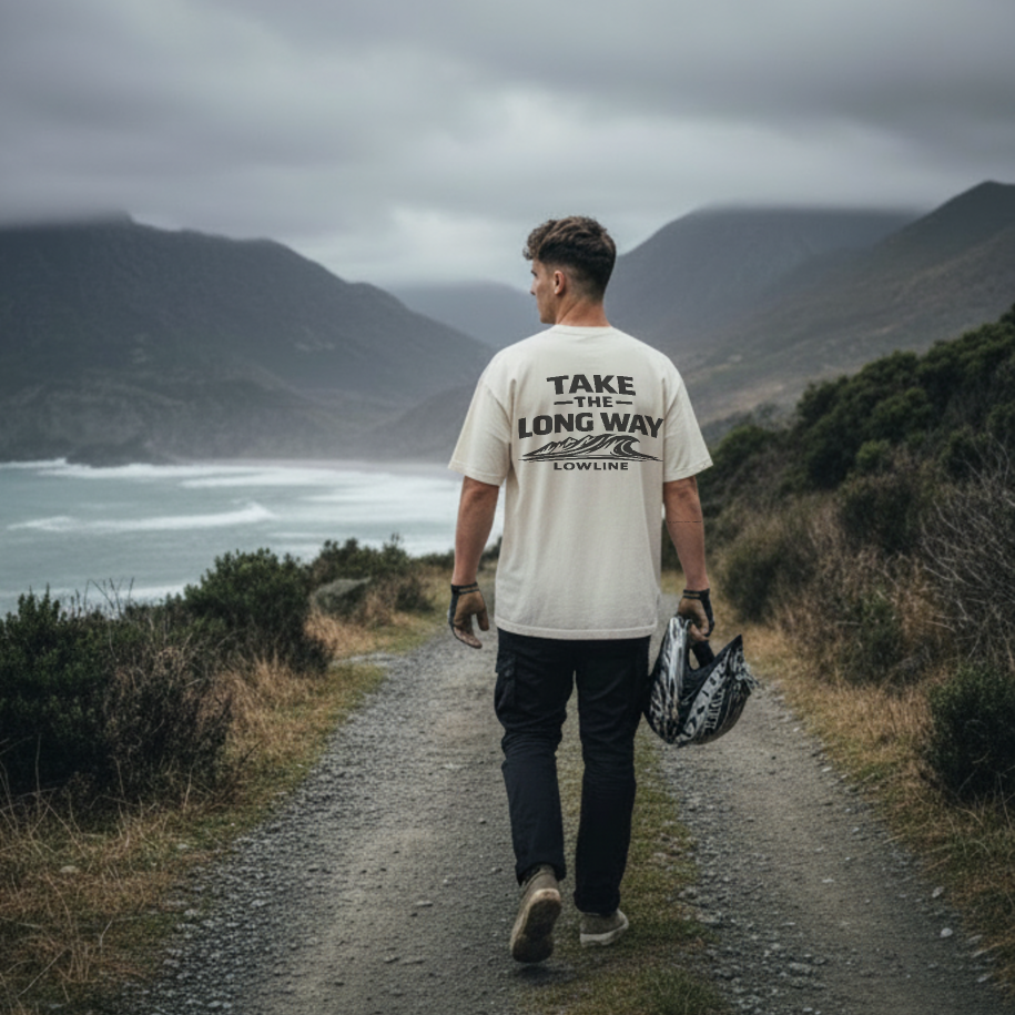 Man walking a costal road, Off-white Take The Long Way Tee – back print 